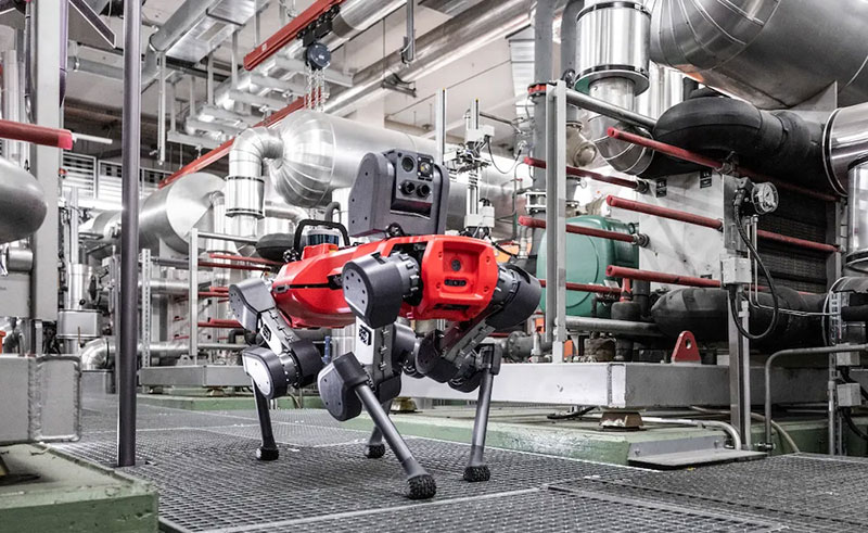 People inspecting parts